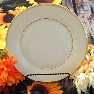 Lenox 10 and 3/4 in dinner plate. Bone ,and gold trim color